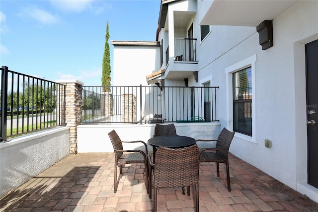 view of terrace featuring a balcony