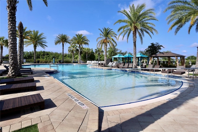 view of swimming pool featuring a gazebo