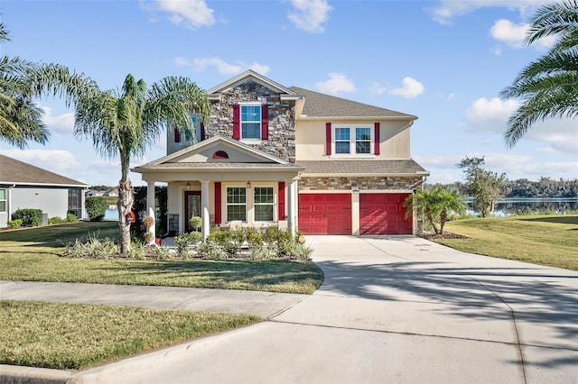 view of front facade featuring a front lawn and a garage