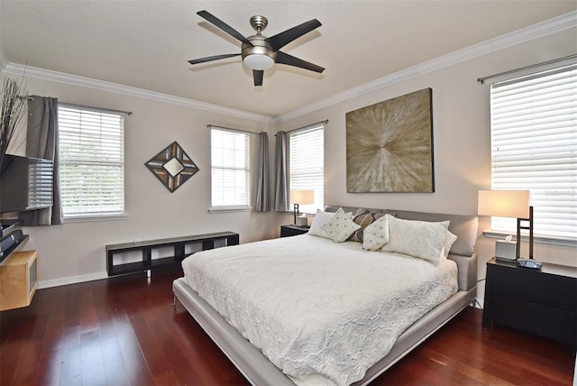 bedroom with crown molding, dark hardwood / wood-style flooring, and multiple windows