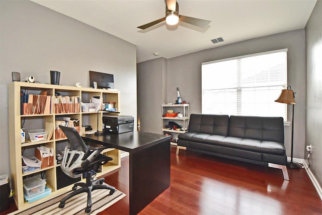 office space with dark wood-type flooring and ceiling fan