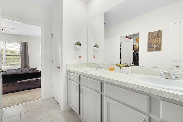 bathroom featuring dual bowl vanity, tile flooring, and ceiling fan