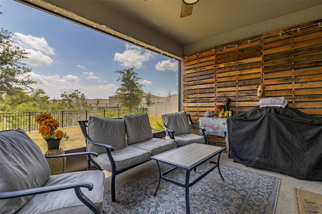 view of patio with outdoor lounge area, grilling area, and ceiling fan