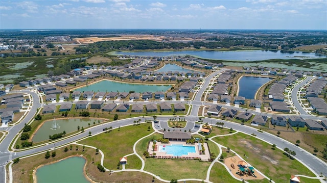 birds eye view of property featuring a water view