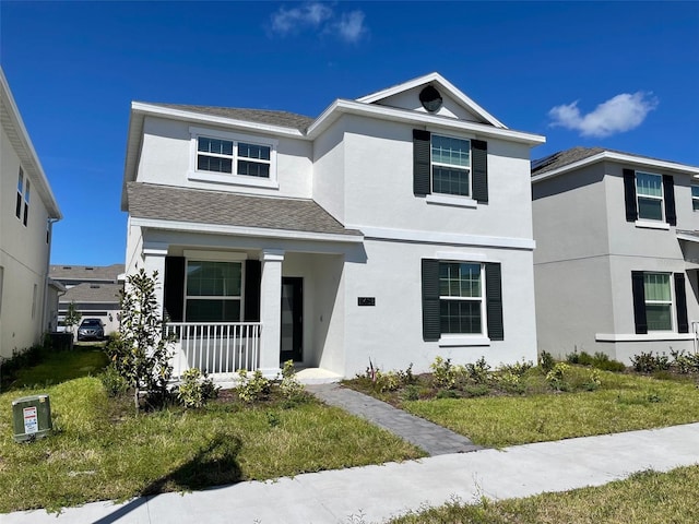 front facade with a front lawn