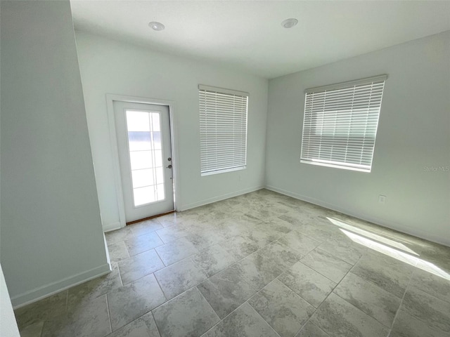 view of tiled spare room