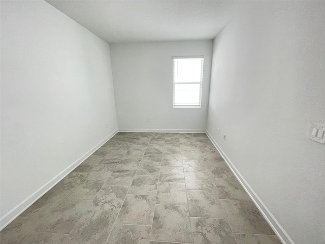 view of tiled spare room