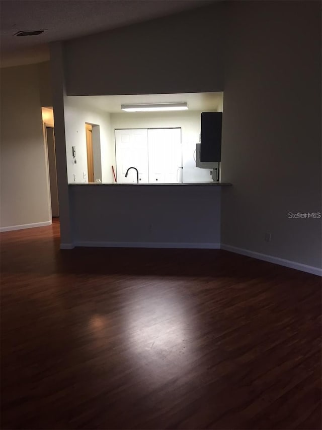 interior space featuring dark hardwood / wood-style flooring