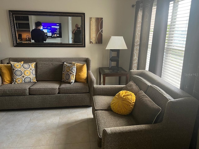 living room with tile patterned floors