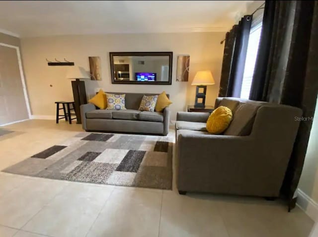 tiled living room with crown molding