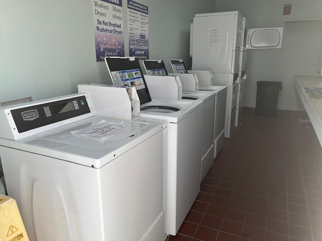 3100 Parkway Blvd Unit 717, Kissimmee, FL 34747 - communal laundry room with washer and dryer