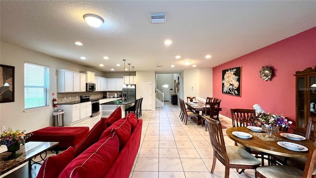 interior space with a textured ceiling