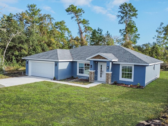 single story home featuring a front lawn and a garage