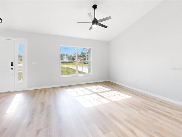 interior space featuring light hardwood / wood-style floors, lofted ceiling, and ceiling fan