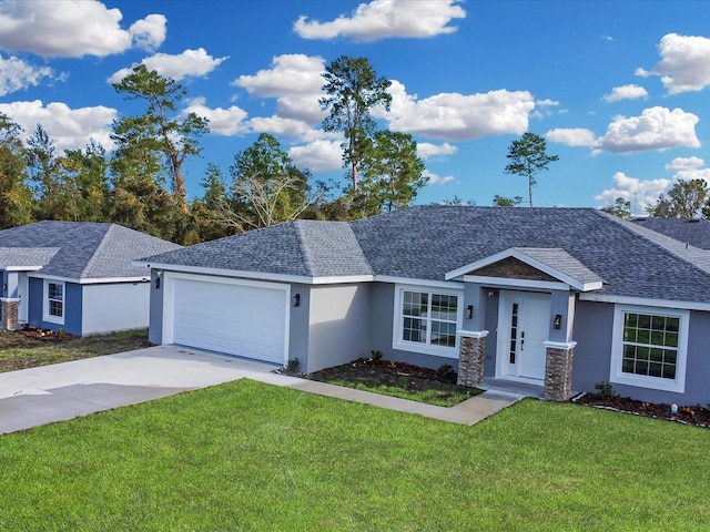 view of front facade featuring a front yard and a garage