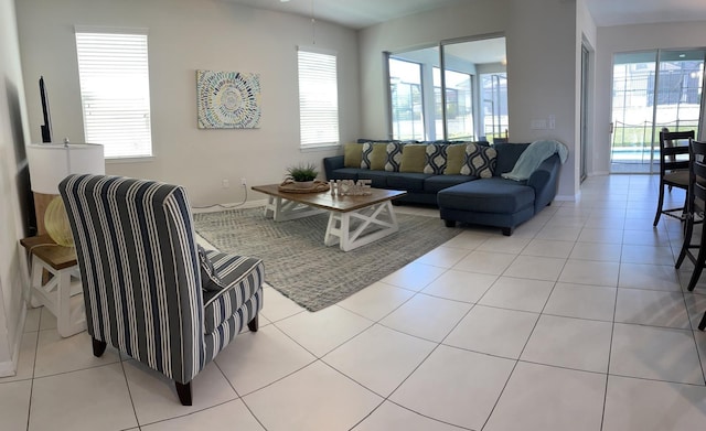 living room featuring light tile floors