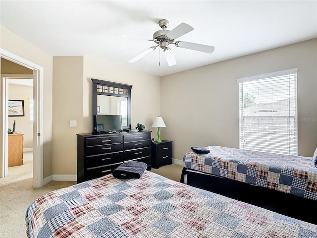 bedroom featuring carpet and ceiling fan