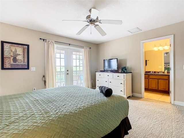 bedroom with french doors, access to exterior, ceiling fan, connected bathroom, and light colored carpet