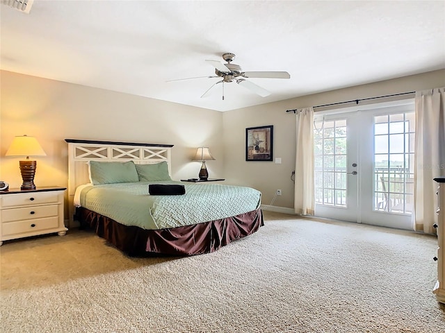 bedroom with french doors, light colored carpet, access to outside, and ceiling fan