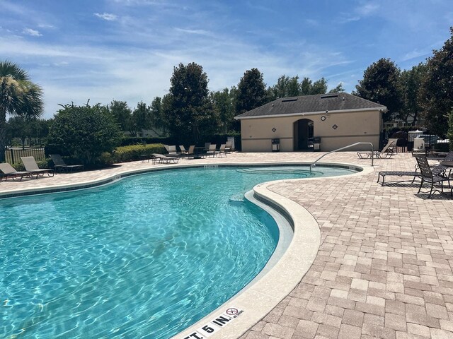 view of pool with a patio