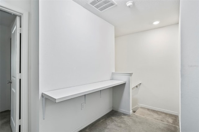 interior space featuring visible vents and baseboards