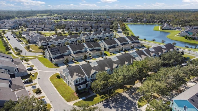 bird's eye view with a residential view and a water view