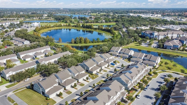 bird's eye view featuring a residential view and a water view