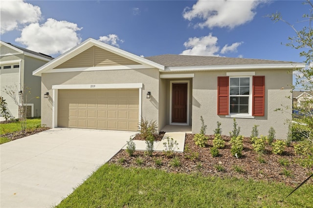 ranch-style home featuring a garage