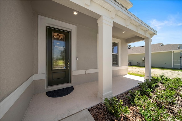 property entrance featuring central AC