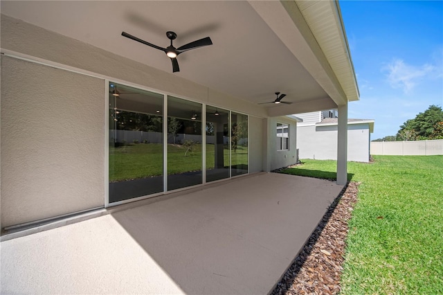 view of patio / terrace featuring ceiling fan