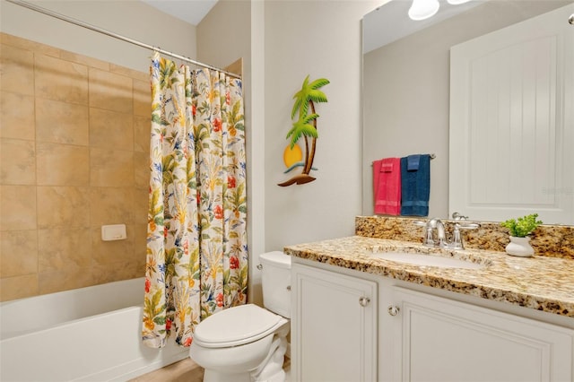 full bathroom featuring vanity, shower / bath combo, and toilet