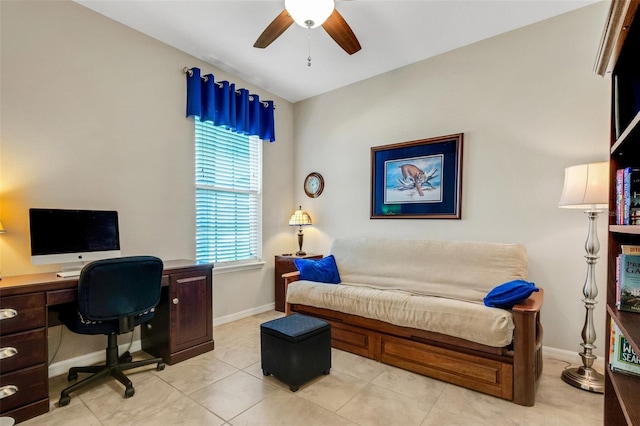 tiled home office featuring ceiling fan