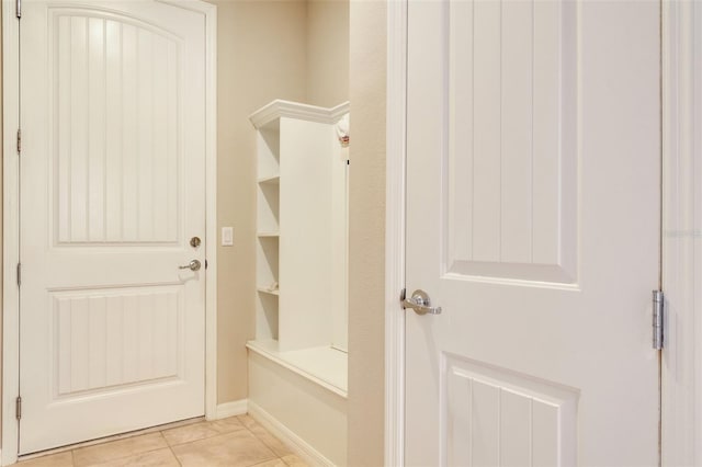 mudroom featuring light tile patterned flooring