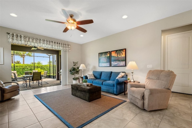 tiled living room featuring ceiling fan