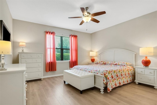 bedroom featuring light hardwood / wood-style flooring and ceiling fan