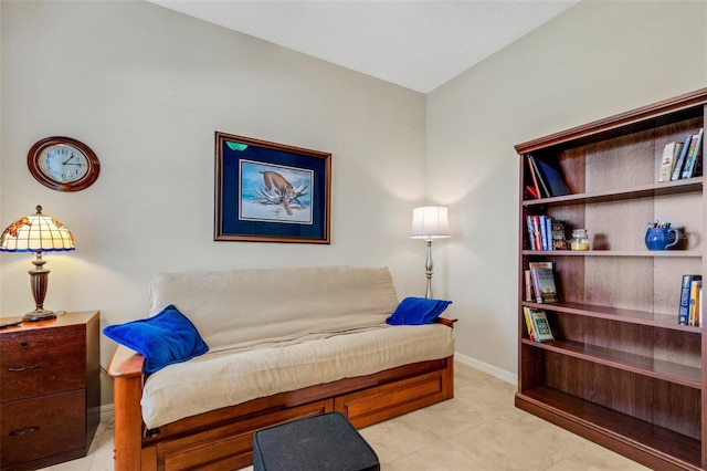 sitting room featuring light tile patterned flooring