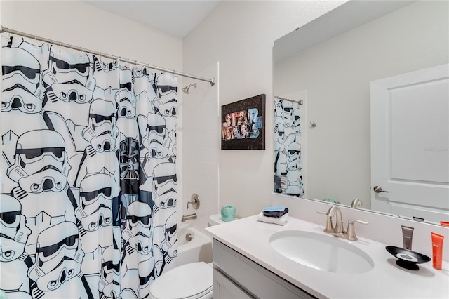 full bathroom featuring toilet, vanity, and shower / tub combo with curtain