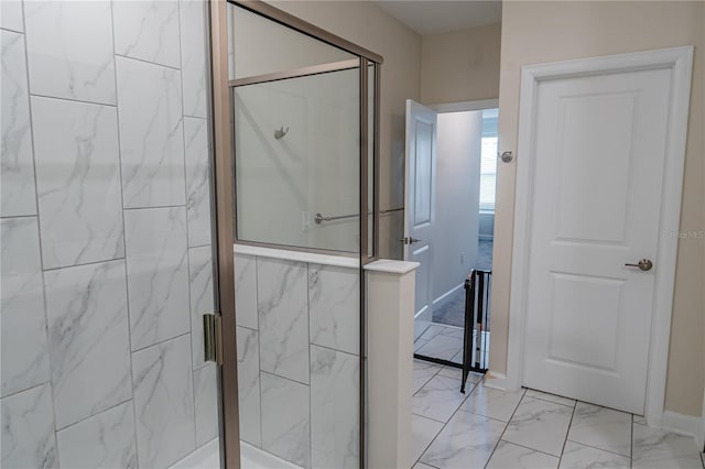 bathroom featuring an enclosed shower