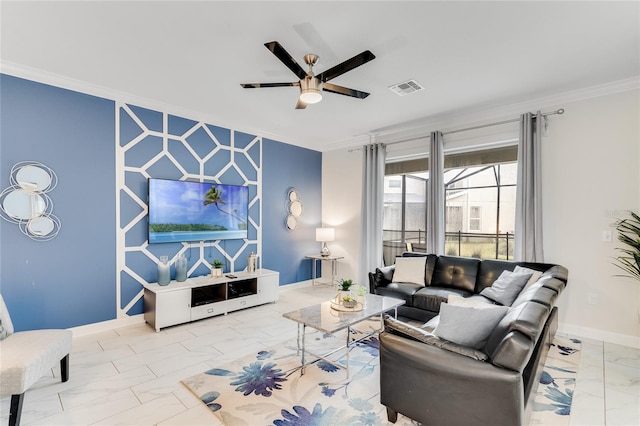 living room featuring ornamental molding and ceiling fan