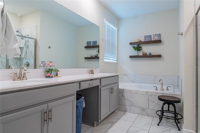 bathroom with shower with separate bathtub and vanity