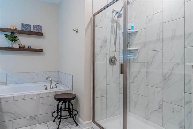 bathroom with shower with separate bathtub