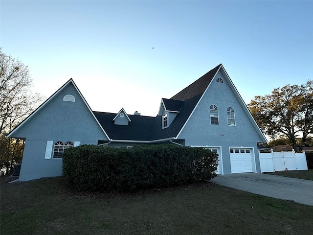 view of front of property with a garage