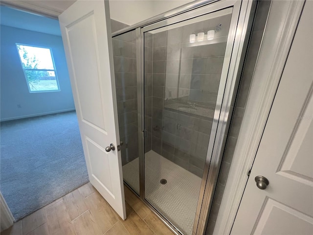 bathroom featuring walk in shower