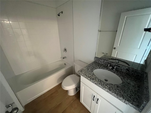 full bathroom with toilet, tub / shower combination, wood-type flooring, and vanity