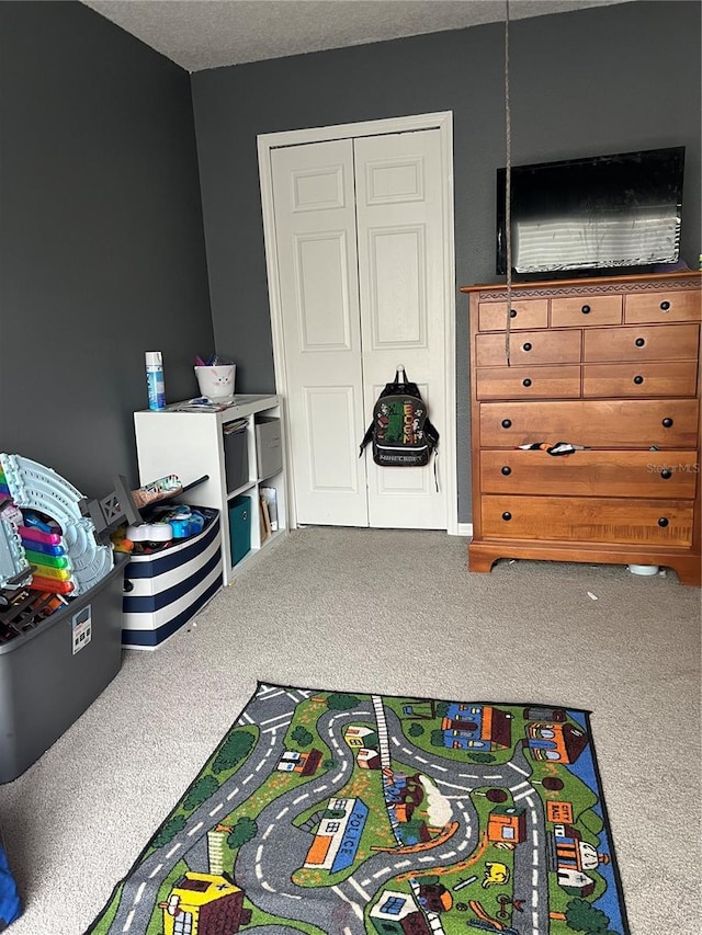 playroom featuring carpet