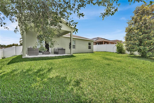 view of yard with a patio area