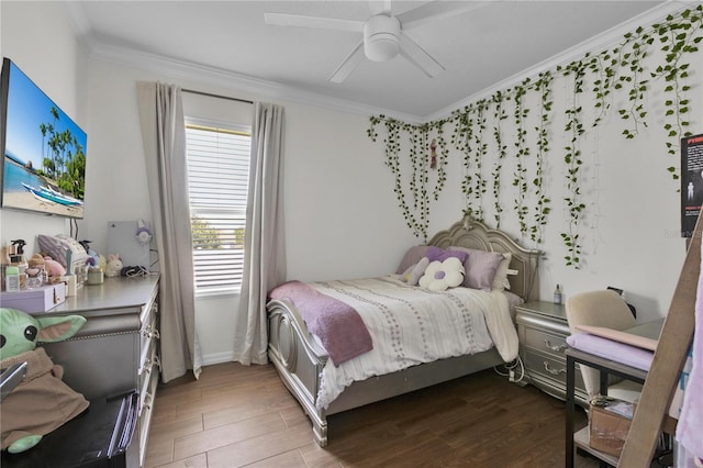 bedroom with ornamental molding, dark hardwood / wood-style floors, and ceiling fan