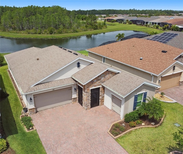 drone / aerial view featuring a water view