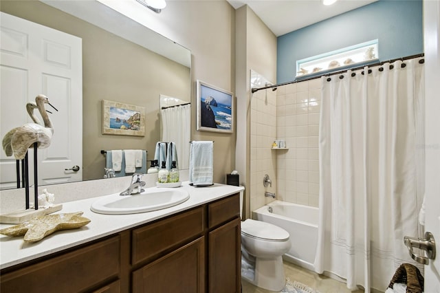 full bathroom featuring tile patterned floors, vanity, shower / tub combo, and toilet