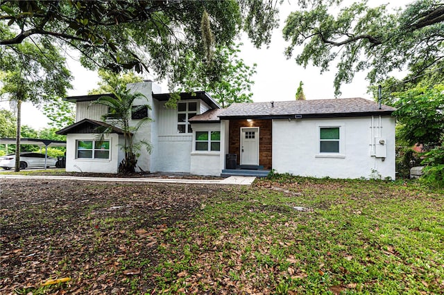 view of front of house with a carport